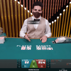 Live dealer at Authentic Gaming's Multibet Baccarat table